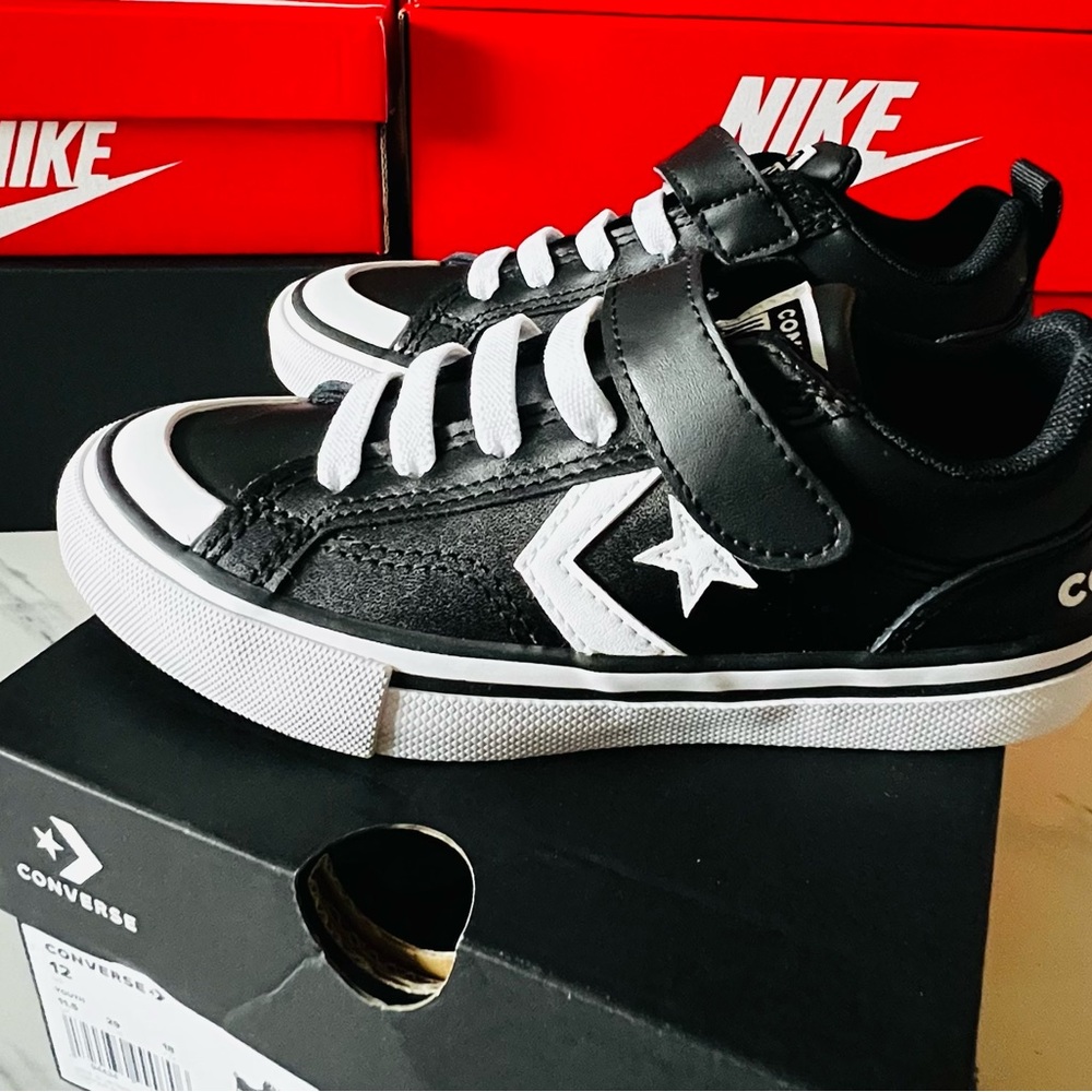 Converse Kids' Black and White Sneakers in youth 12